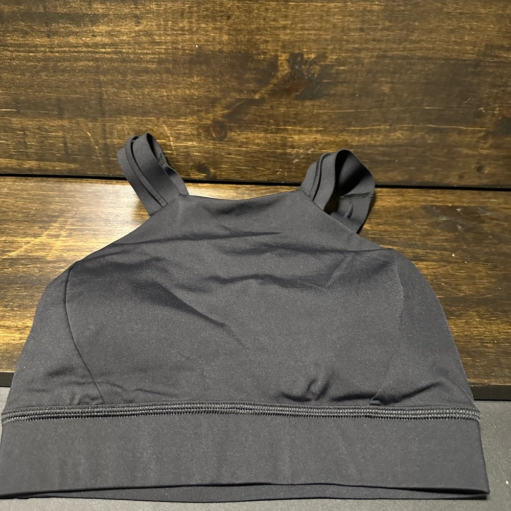 Black strappy Lululemon sports bra size 4